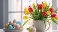 White plate with colored easter eggs, bouquet of multicolored tulips flowers in vase on white kitchen table near window. Royalty Free Stock Photo