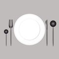 Plate with cutlery on a tablecloth Royalty Free Stock Photo
