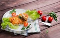 white plate glass portion of the baked cod fish Royalty Free Stock Photo