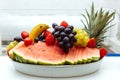 White plate grapes arrangement fruits berries breakfast buffet banana watermelon strawberry hotel breakfast