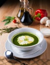 White plate with green soup