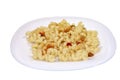 A white plate of macaroni with ketchup. Isolated on white background with clipping path. Close-up