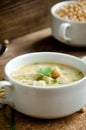 White plate pea soup board Royalty Free Stock Photo