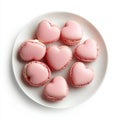 A white plate with pink heart-shaped macaroons and cookies, isolated on a transparent background, using image Royalty Free Stock Photo