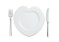 White plate in shape of heart, spoon and fork isolated on white