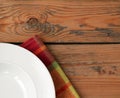 White plate with tissued napkin Royalty Free Stock Photo