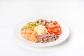 White plate with tomatoes, cucumbers, mushrooms and meat. Royalty Free Stock Photo