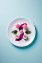 A white plate topped with sushi on top of a blue surface. AI generative image. Top view.