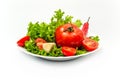 White plate with vegetables isolated on white background. Front view. Tomato, pepper, salad,garlic