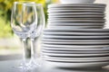 White plates and wine glasses Royalty Free Stock Photo