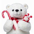 White Plush Polar Bear with Candy Cane and Mini Reindeer Toy on White Backdrop Royalty Free Stock Photo