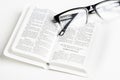 White Pocket Bible With Reading Glasses Royalty Free Stock Photo