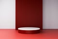 White podium against a deep red ribbed background Royalty Free Stock Photo