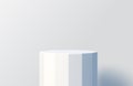 White podium -  faceted column for product presentation. Minimal scene with podium stage, Royalty Free Stock Photo