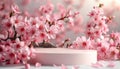 white podium or platform on pink cherry blossoms background, for presentation and advertising of products Royalty Free Stock Photo