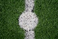 White point on artificial grass football pitch Royalty Free Stock Photo
