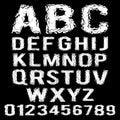 White polygonal broken alphabet on a black