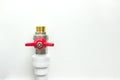 White polypropylene pipe and red faucet. Fittings for water pipes - an example of a connecting unit when creating a water supply Royalty Free Stock Photo