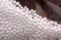 White polystyrene foam balls as background Royalty Free Stock Photo