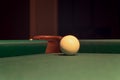 White Pool Ball on Billiard Table Near the Hole Royalty Free Stock Photo