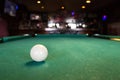 A white pool ball on a pool table. Royalty Free Stock Photo