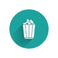 White Popcorn in cardboard box icon isolated with long shadow. Popcorn bucket box. Green circle button. Vector