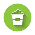 White Popcorn in cardboard box icon isolated with long shadow. Popcorn bucket box. Green circle button. Vector