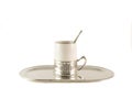 White porcelain coffee Cup with silver spoon on tray Royalty Free Stock Photo