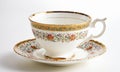 White porcelain cup and saucer with a pattern on a white background Royalty Free Stock Photo