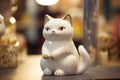 white porcelain figurine of a cat Royalty Free Stock Photo
