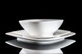 White porcelain plate on table. Dinner background. Empty round round isolated on black background. Restaurant kitchen Royalty Free Stock Photo