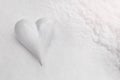 White porcelein heart on real winter snow