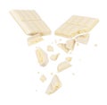 White porous chocolate broken into pieces in the air