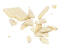 White porous chocolate broken into pieces in the air