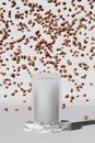White pouch bag mockup falling coffee beans marble podium light background 3D render. Merchandise advertising packaging Royalty Free Stock Photo