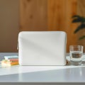 White Pouch Books Water Glass on Clean Desk Royalty Free Stock Photo
