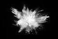 White powder explosion on black background.