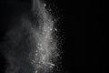 White powder explosion on black background. Colored cloud. Multi