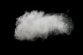 White powder explosion on black background.Stopping the movement of white powder on dark background. Royalty Free Stock Photo