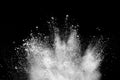 White powder explosion on black background.