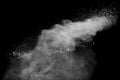 White powder explosion clouds.Freeze motion of white dust particles splash on black background Royalty Free Stock Photo