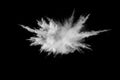 White powder explosion.Freeze motion of white dust particles on black background Royalty Free Stock Photo