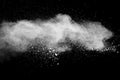 White powder explosion.Freeze motion of white dust particles on black background Royalty Free Stock Photo