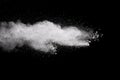 White powder explosion.Freeze motion of white dust particles on black background Royalty Free Stock Photo