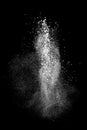 White powder explosion isolated on black