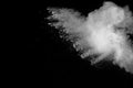 Color Holi Festival.White powder explosion isolated on black background. Royalty Free Stock Photo