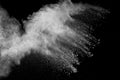 White powder explosion isolated on black background. White dust particles splash.Color Holi Festival Royalty Free Stock Photo