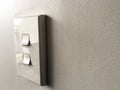 White power switch board on white wall Royalty Free Stock Photo