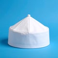 White Prayer Cap Displayed with Studio Lighting Royalty Free Stock Photo