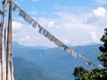 White prayer flags over a clear blue sky in India Royalty Free Stock Photo